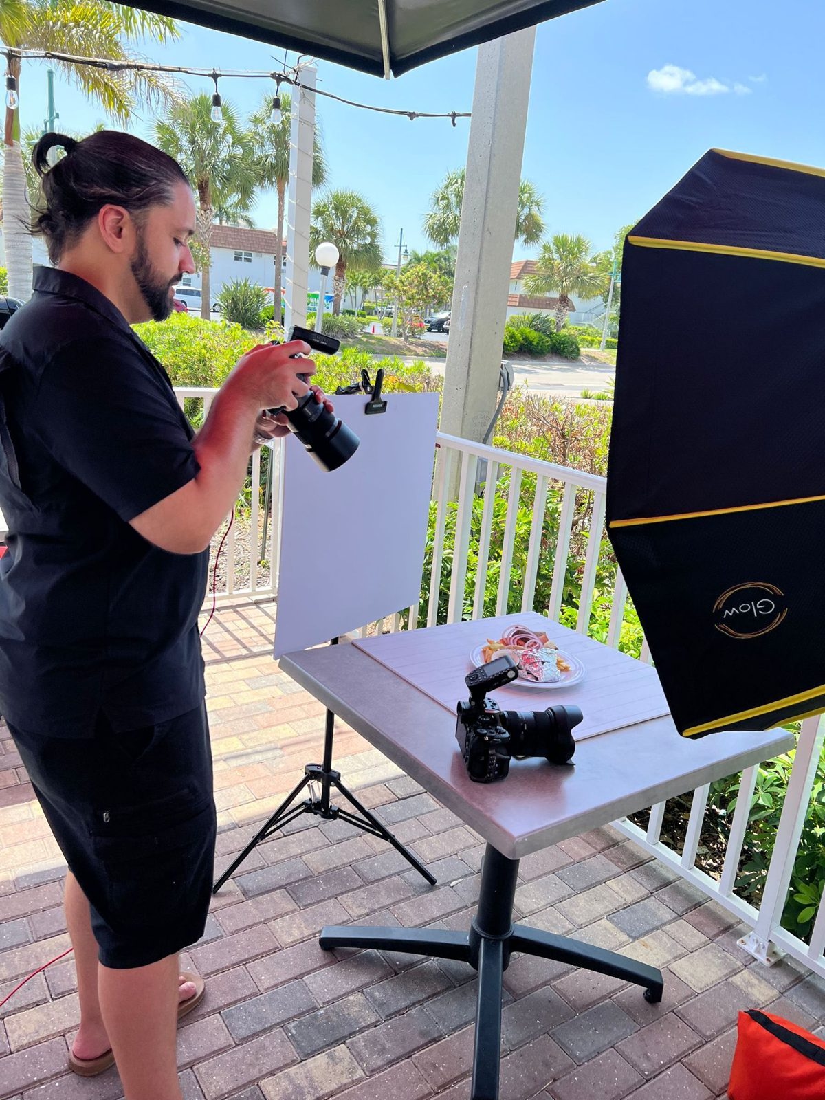 Photographer working a food shoot outdoors