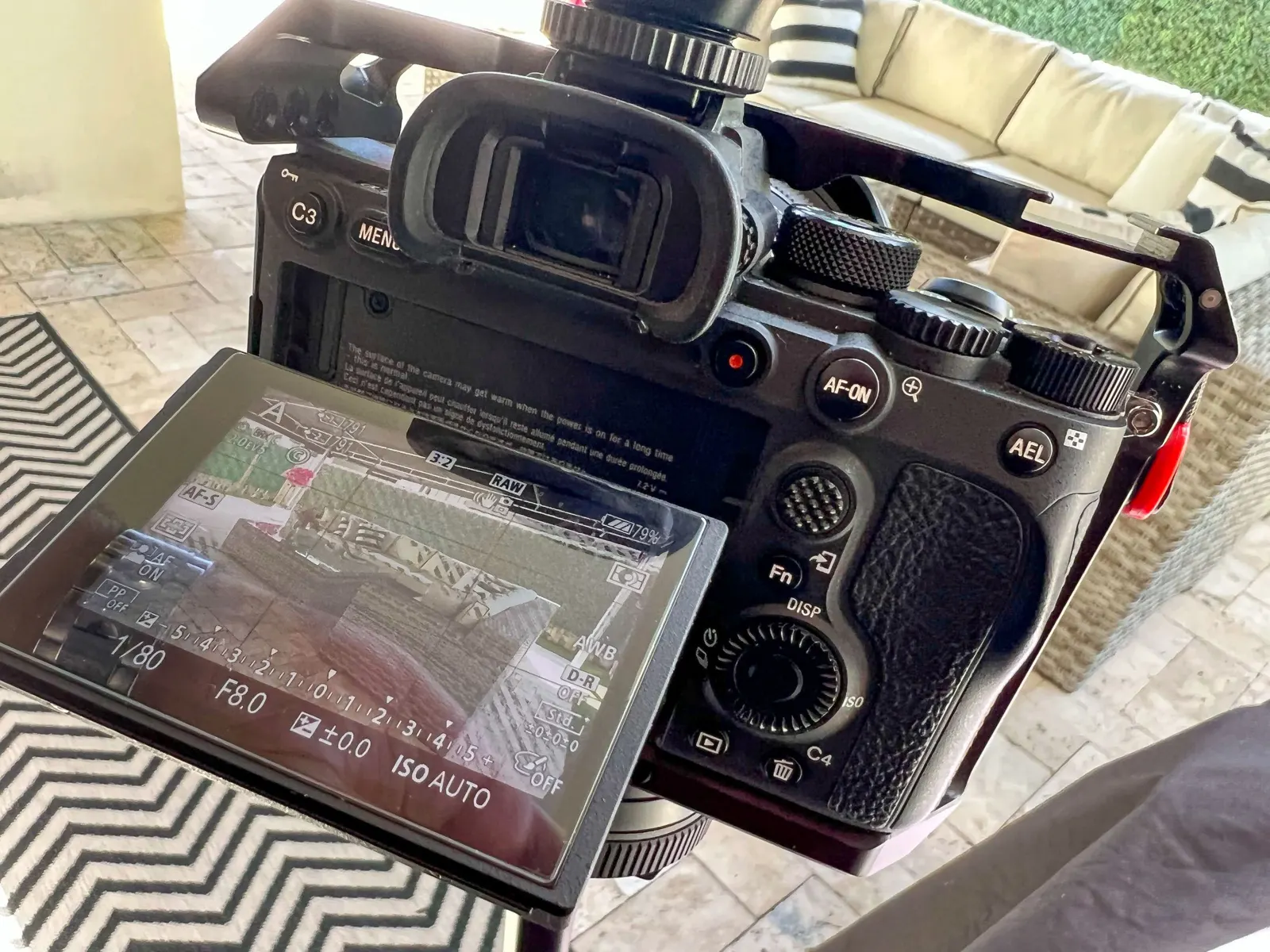 Checking a frame on the camera screen during a shoot