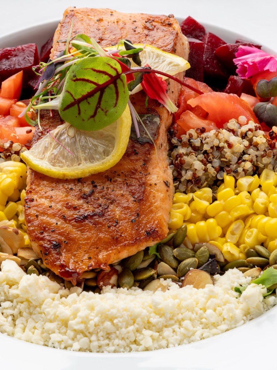 Seared salmon over quinoa, corn and beets