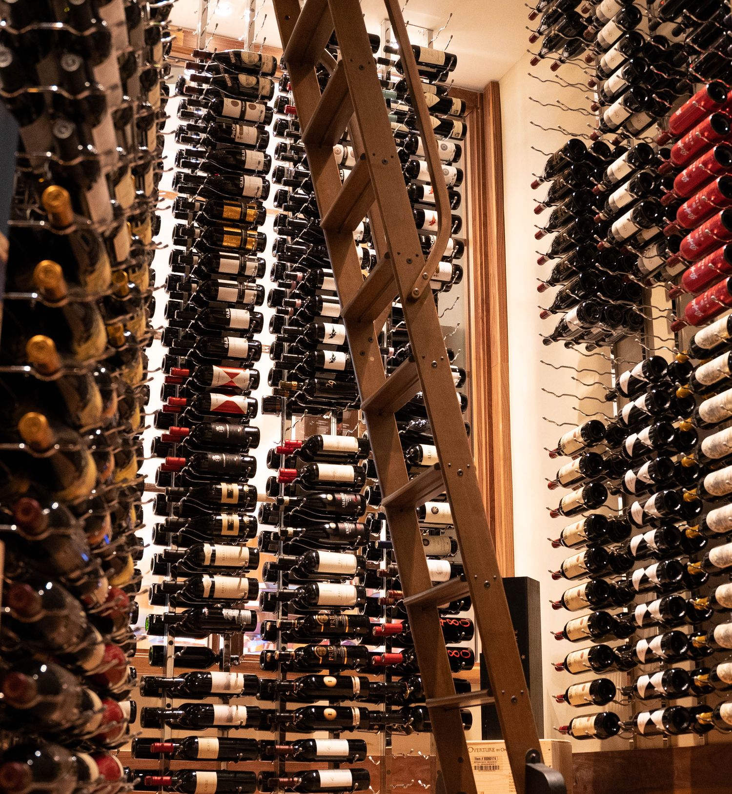 Wine cellar interior with rows of bottled wine