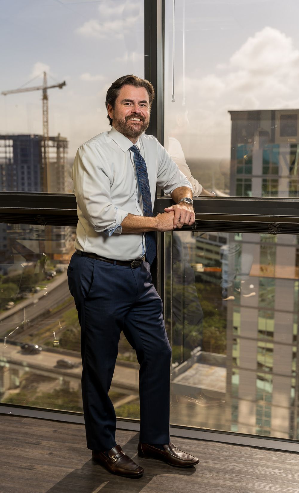 A business portrait, cropped tall for a story ad