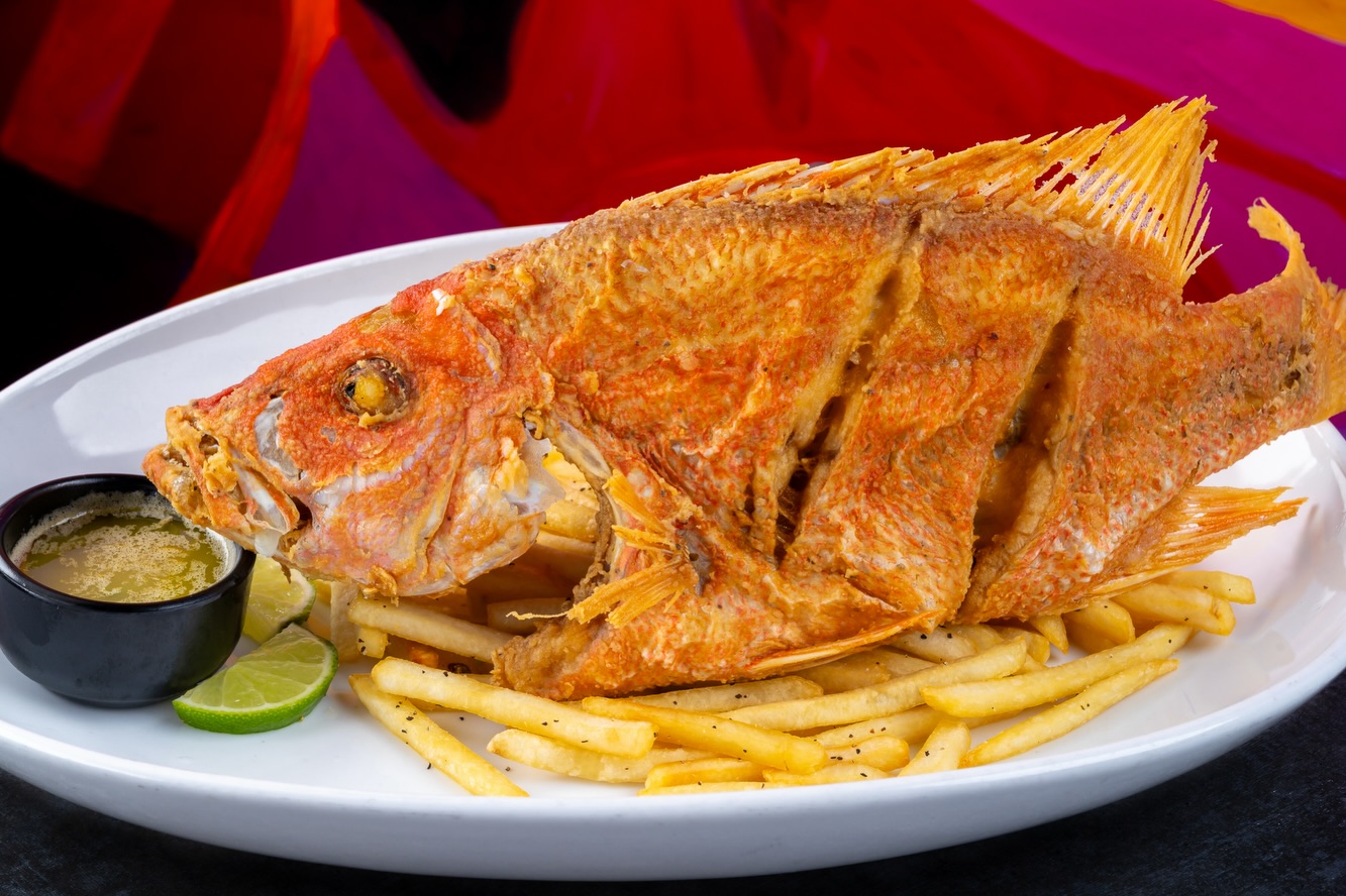 Whole fried lionfish food photography